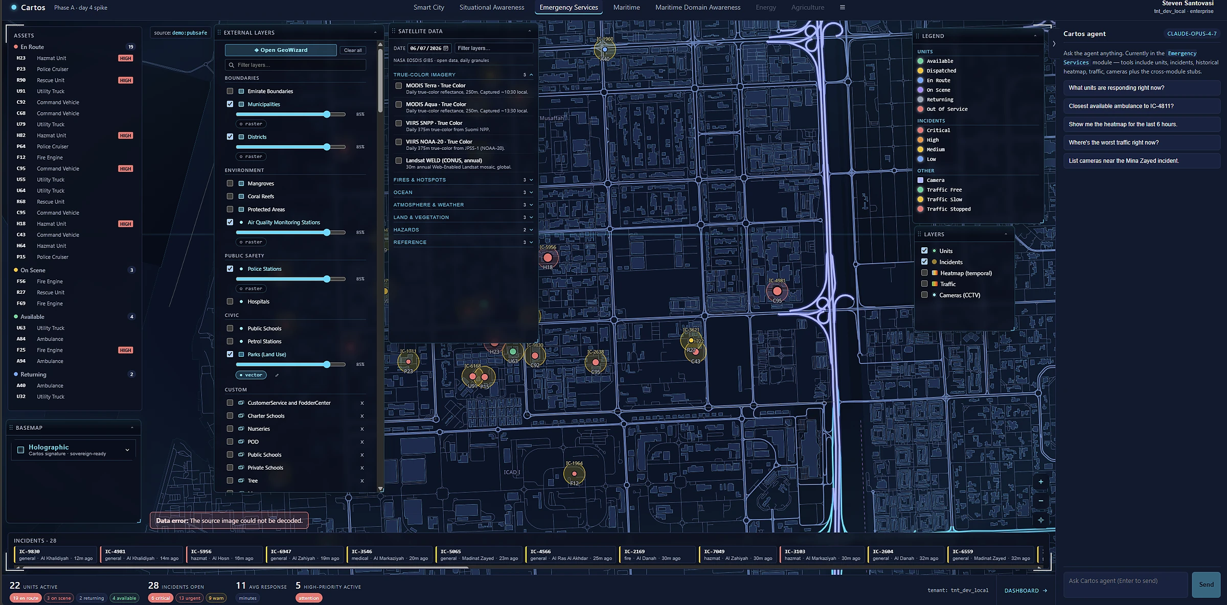 The Cartos operations workspace: a city map with live incident markers, a layer catalog on the left, an incident feed in the centre, and the Cartos AI agent on the right.
