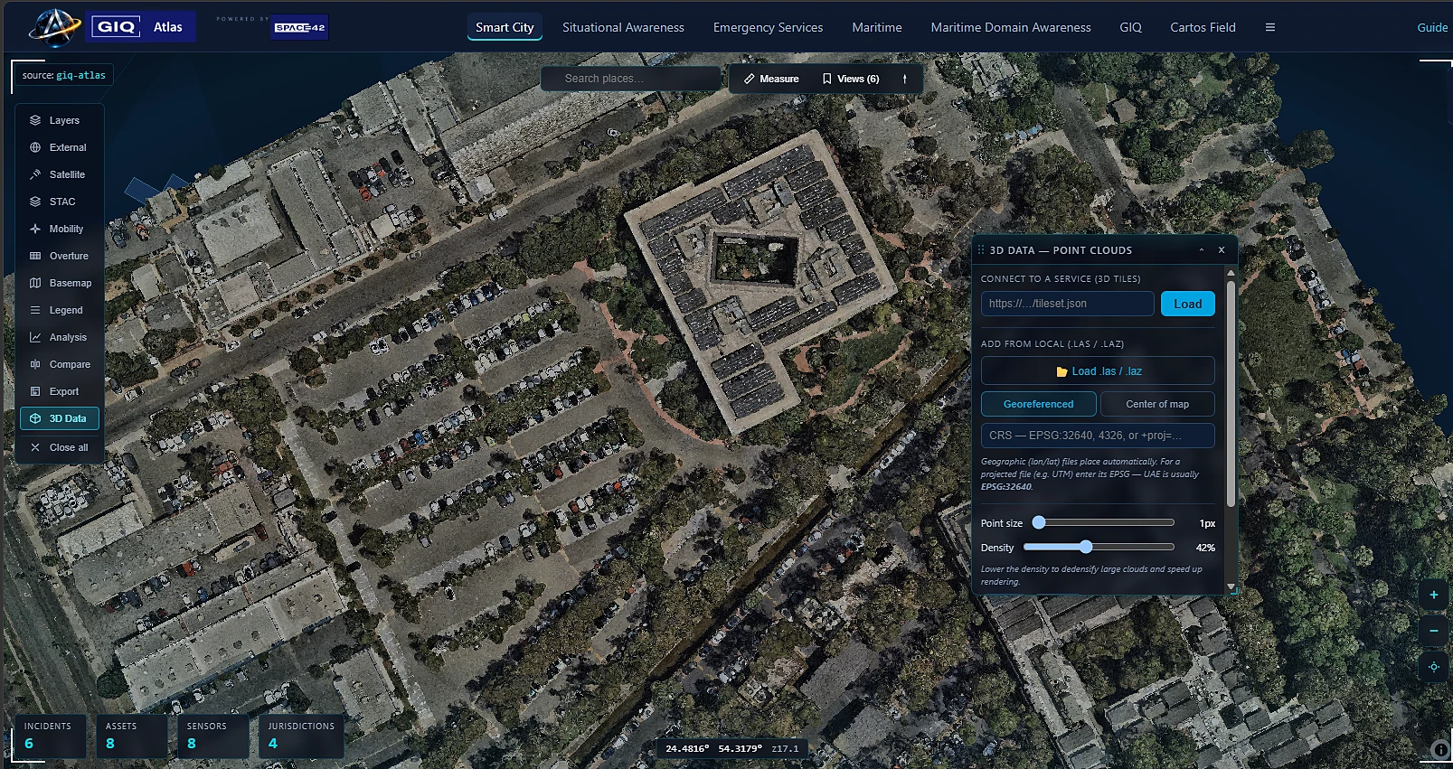 A LAS point cloud rendered in 3D over the Cartos map at a near-ground viewing angle, placed at its true geospatial coordinates.