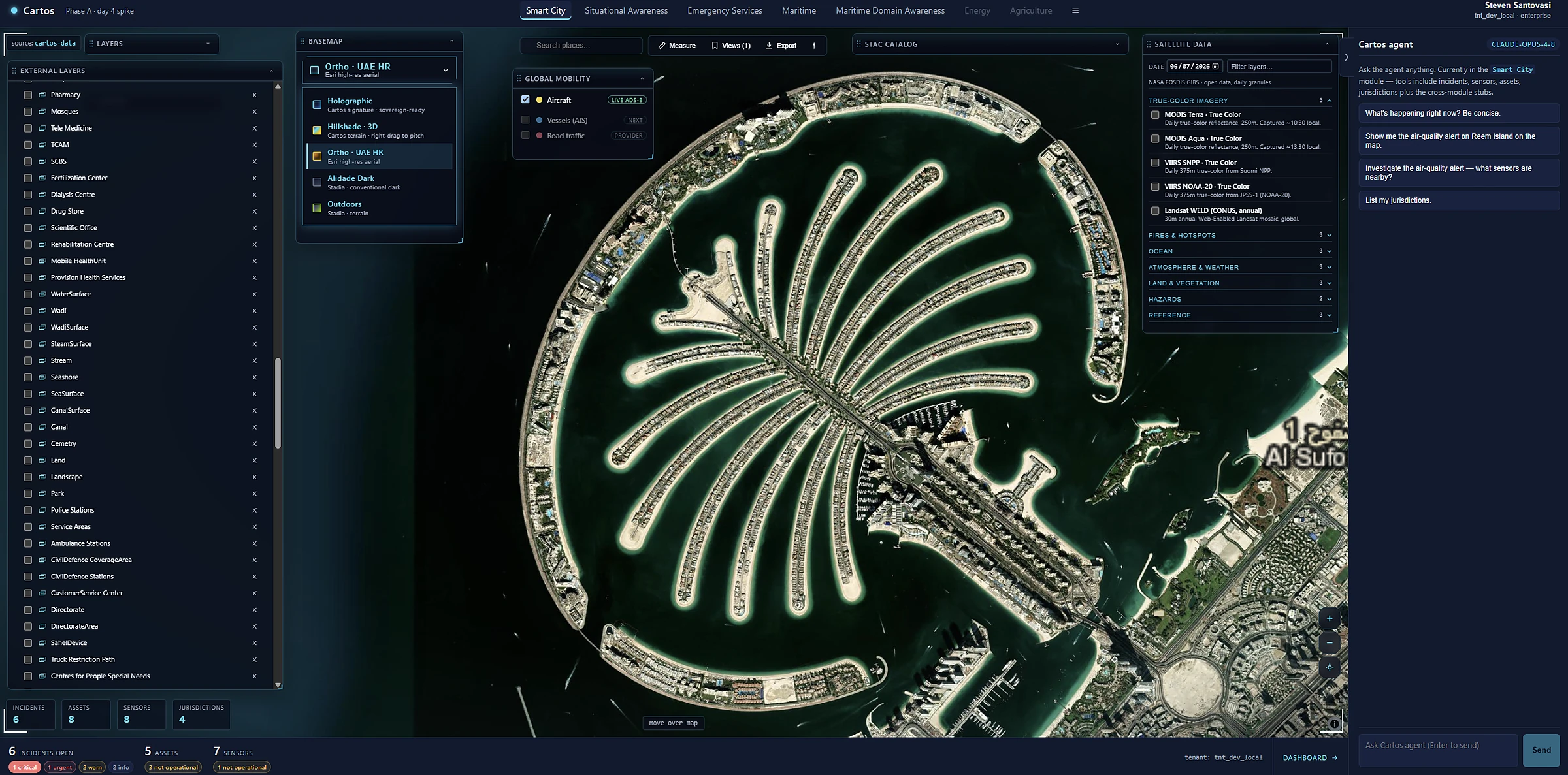 High-resolution satellite imagery of the Palm Jumeirah rendered in the Cartos map surface.